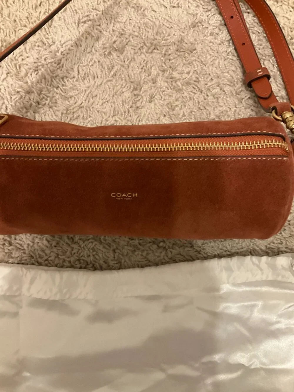 COACH barrel bag. brass/clay. CDy81.